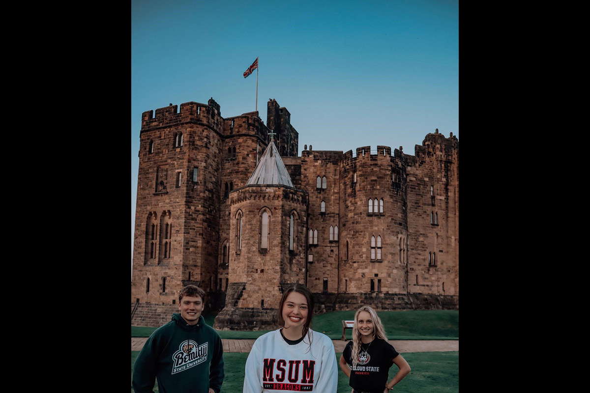 Class photo in front of castle