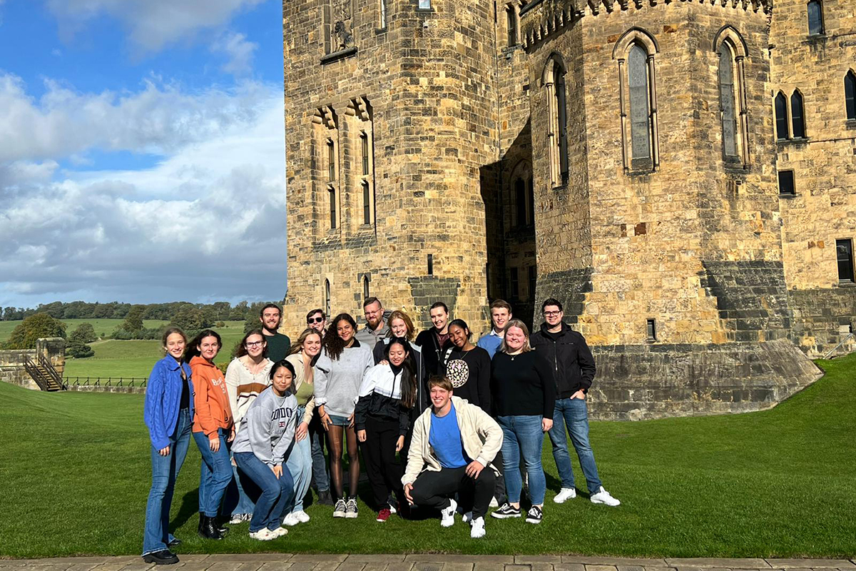 Class photo in front of castle