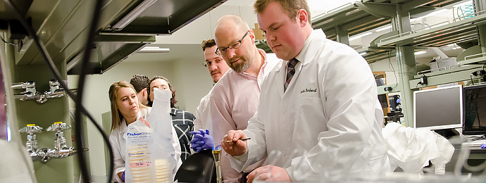 Students and faculty in lab