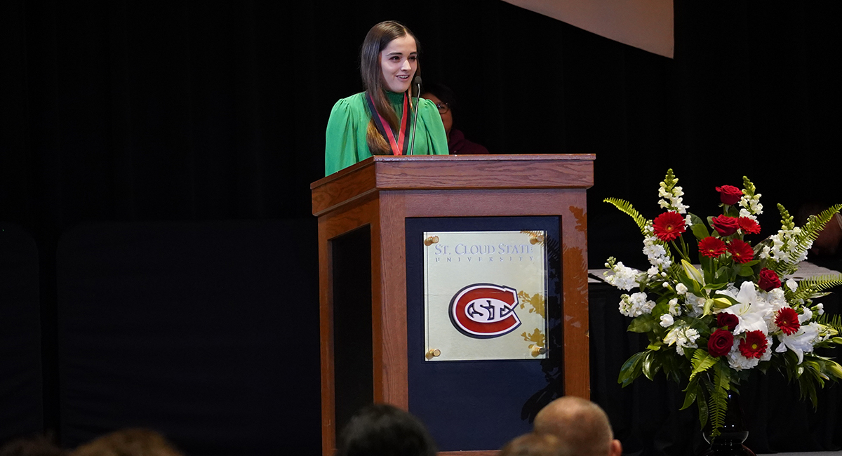 Student speaking at award ceremony