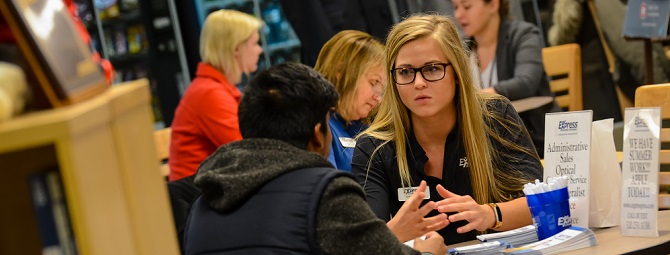 Employer and student discussing careers at Walk In Wednesdays