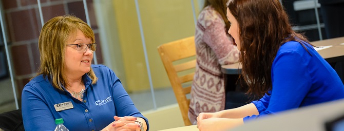 Employer and student discussing careers at Walk In Wednesdays