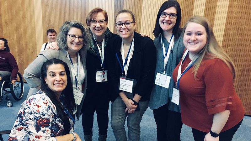 Drs. Johnson and Knopf with students and Maysoon Zayid at the Zero Project Conference