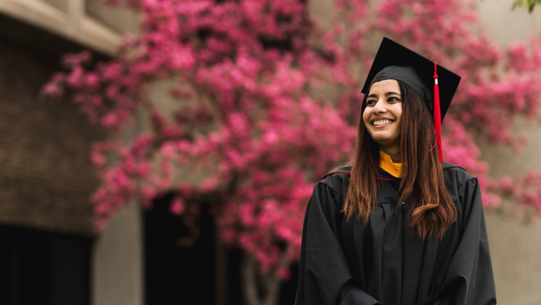 Graduate in cap and gown