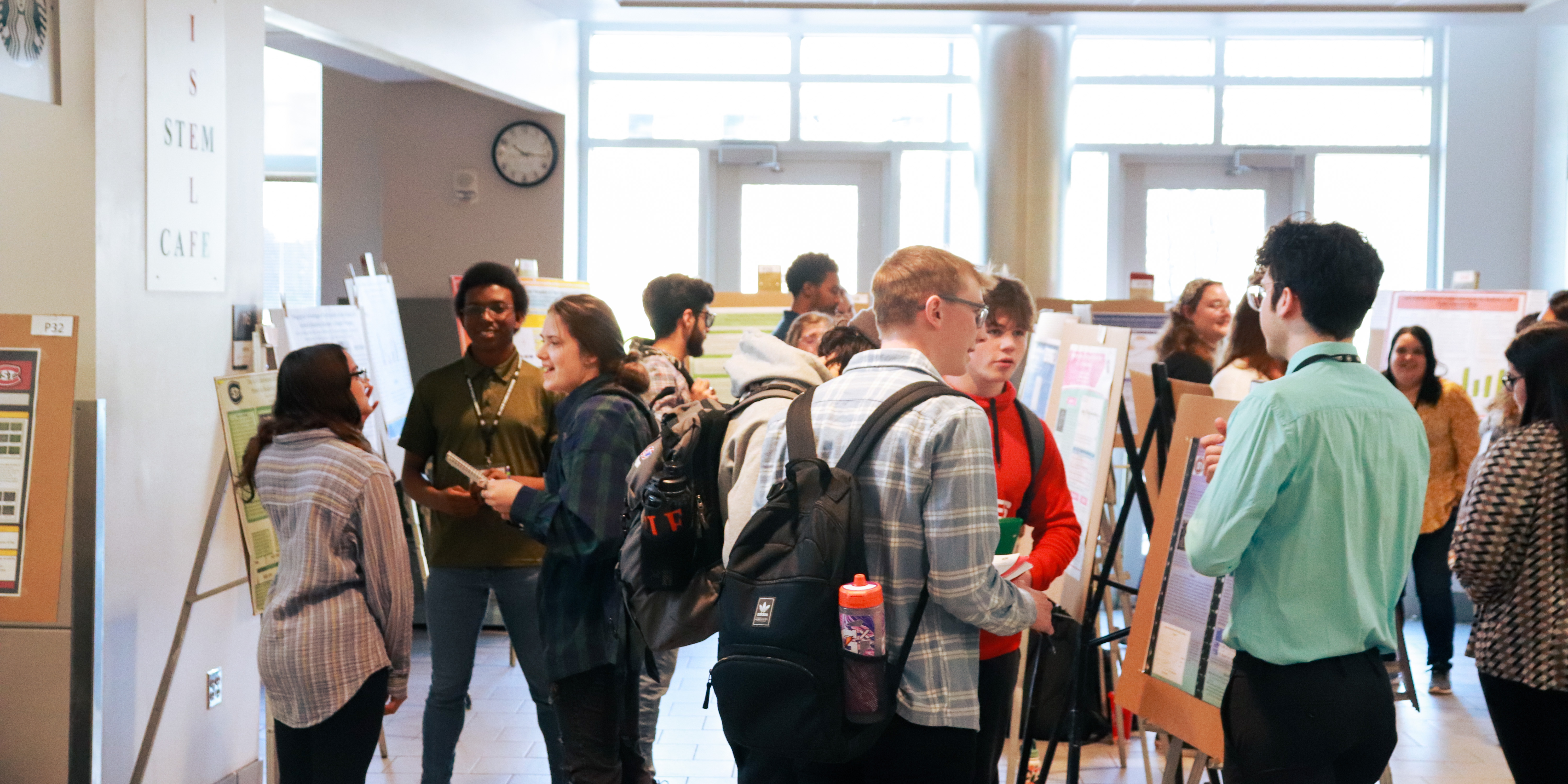 St. Cloud State University students meeting at the College of Science and Engineering Student Research Colloquium