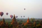 Bagan, Micah Bank:  This photo was taken in my now favorite place on earth, Bagan. Bagan is a tiny town in Myanmar where thousands of ancient Buddha pagodas lay abandoned in fields free for you to frolic in.  After an 8 hour overnight bus ride from the Capital of Myanmar, Yangon, me and three friends had arrived in Bagan at around 4 in the morning with no plans, no hotel reservations, and also no sleep. Being that it was 4 in the morning and we were in the middle of rural Myanmar, taxis were hard to come by. We begged the bus driver to call us a taxi to see if a driver can bring us to a pagoda so we can watch the sunrise. To our surprise, and through a lot of translating, a taxi driver arrived. He brought us to a pagoda where we kicked off our shoes, lugged our huge backpacks up, and slept on the top of a 1500 year old pagoda only to watch the most beautiful sunrise I will ever see in my entire life.