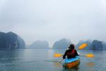 Ha Long Bay, Micah Bank: After sleeping on a massive Vietnamese "Junk Boat" (that's what they call them but they are far from junk) was such a surreal experience. The morning of kayaking, we decided to wake up at about 630 am to catch the end of the sunrise and also because the captain was finished making his delicious Vietnamese coffee.  At any rate, kayaking through the massive rock pillars protruding out from the Ha Long Bay waters was something that cannot be explained. The natural sounds and smells that Ha Long Bay creates in the morning is a beautiful mixture of fresh greenery and clean salt water. If you ever have to opportunity to be in Vietnam, Ha Long Bay is a must. 