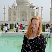 Paige Ehalt standing in front of the Taj Mahal in India
