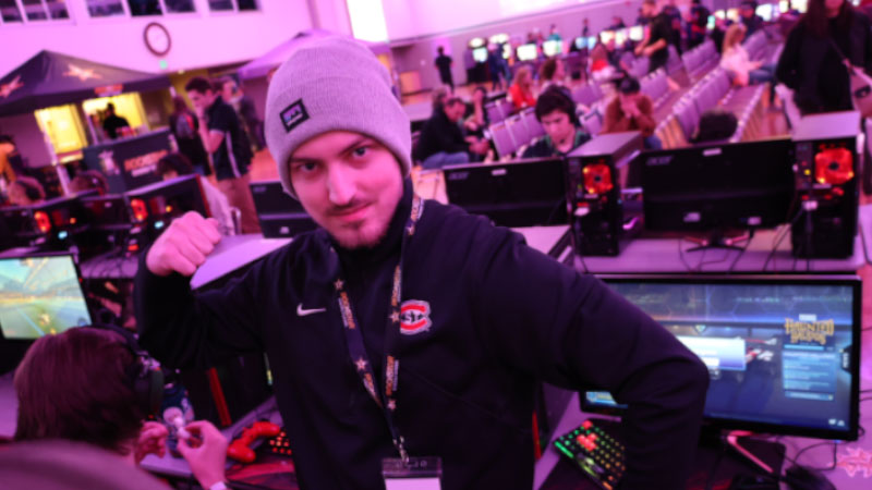 person in front of computer at an esports event