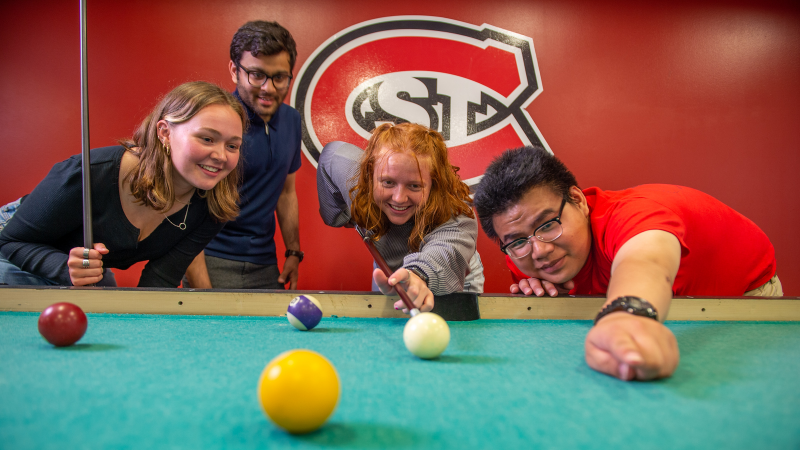 Students playing pool 