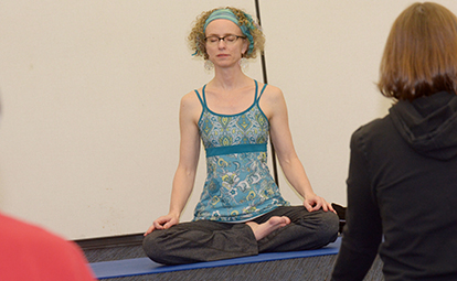 Beth Berila teaches a yoga class at St. Cloud State.