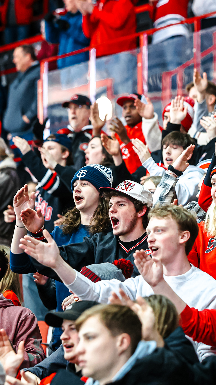 SCSU students cheering at a hockey game