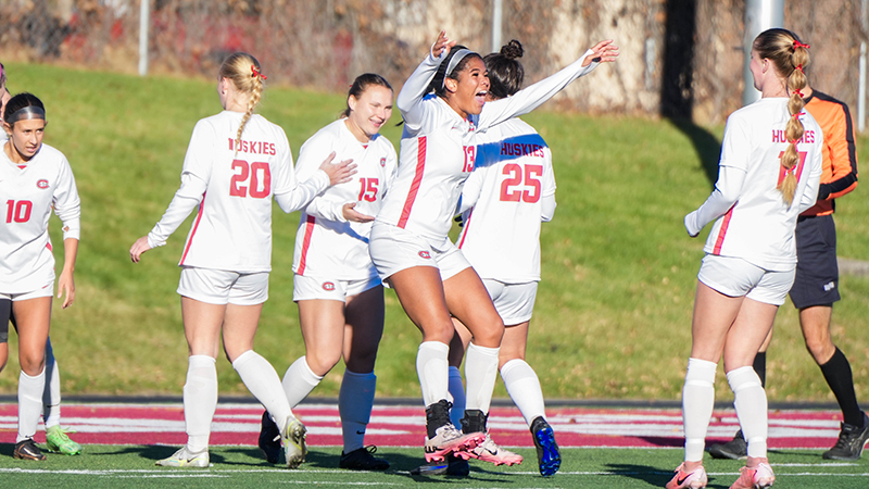 SCSU Women's Soccer team celebrating after a goal