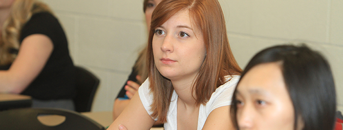 St. Cloud State students listen intently during class