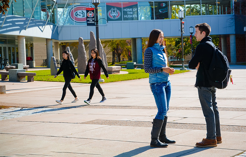 Students talking on the Atwood Mall