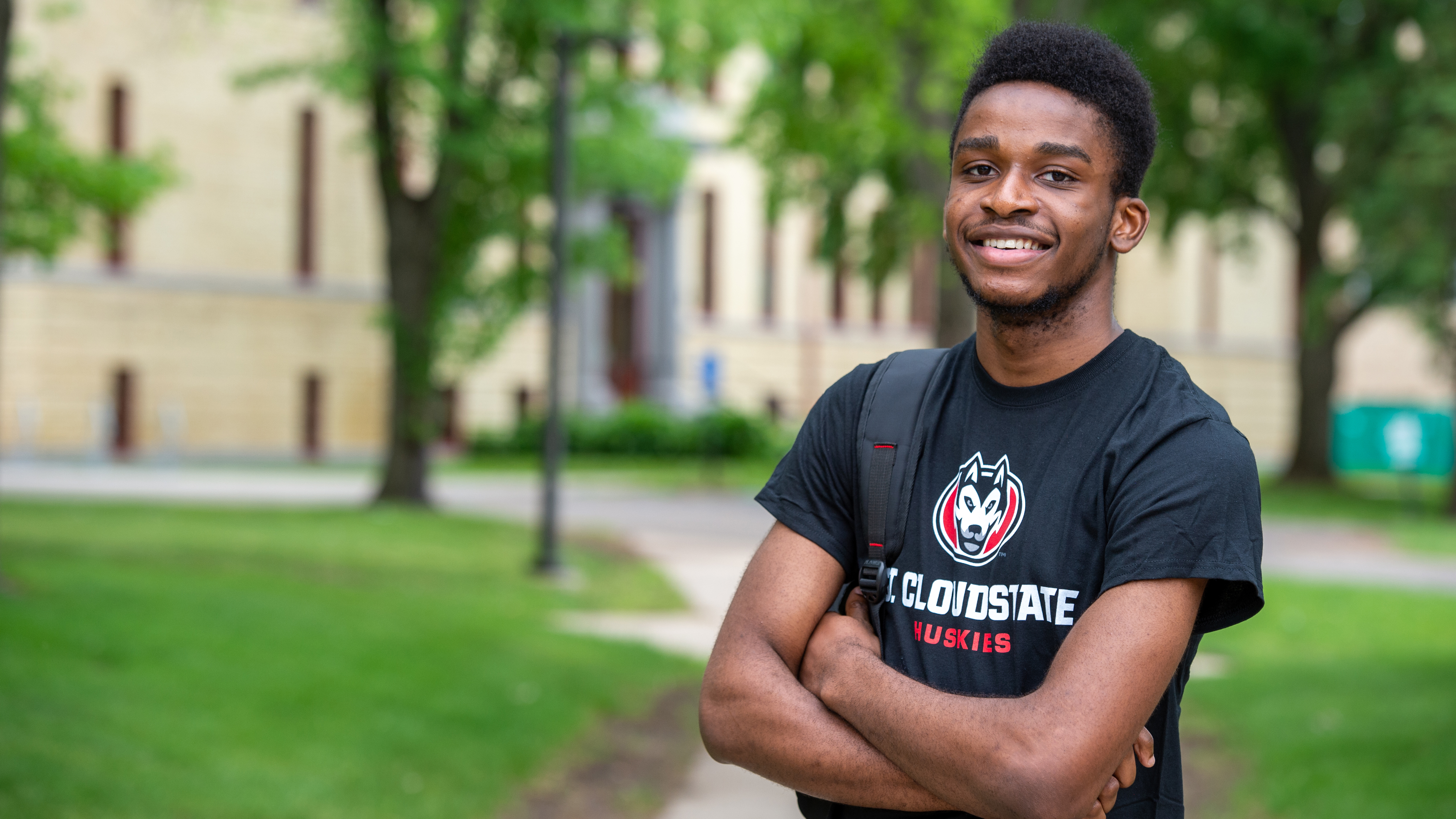 Student smiling with backpack