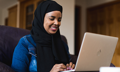 Student on laptop at home