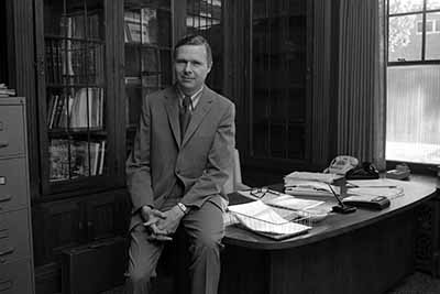 St. Cloud State president Charles Graham in his Whitney House office, 1971