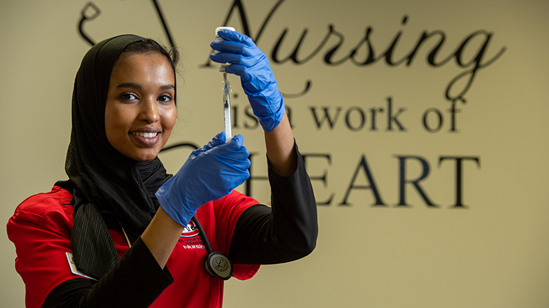 Student with syringe