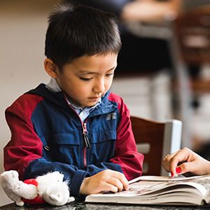 Child looking at book