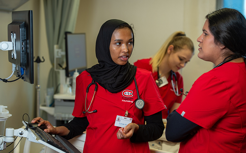 Nursing student at bedside simulation