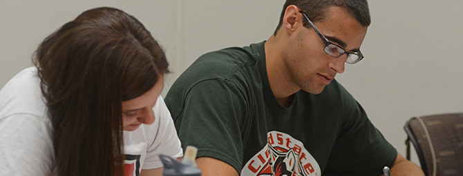 St. Cloud State students work in class.