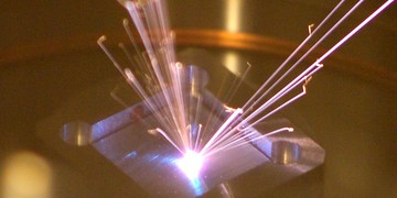 Aluminum being vaporized by a laser beam