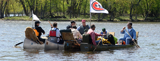Alumni Group Canoeing n the Mississippi River