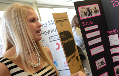 A social work student presents in Atwood Ballroom