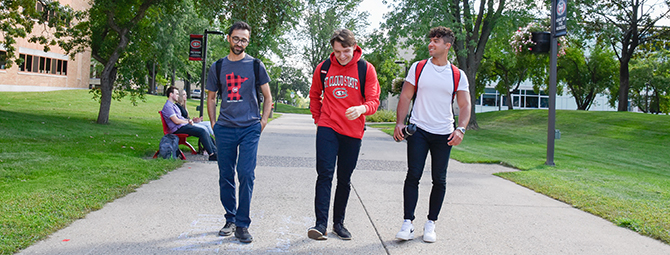 Three students walking