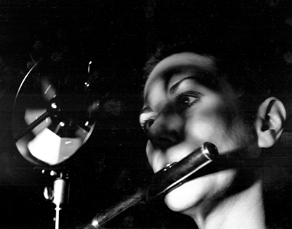 Barbara Held playing the flute