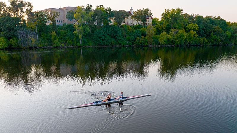 Students rowing on the Mississippi River by SCSU campus