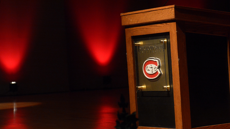 Podium with SCSU logo on empty stage