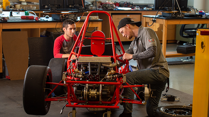 Students working on race car