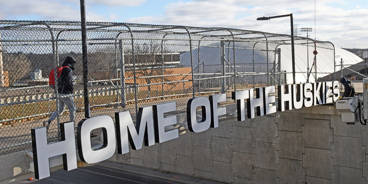 "Home of the Huskies" on pedestrian bridge