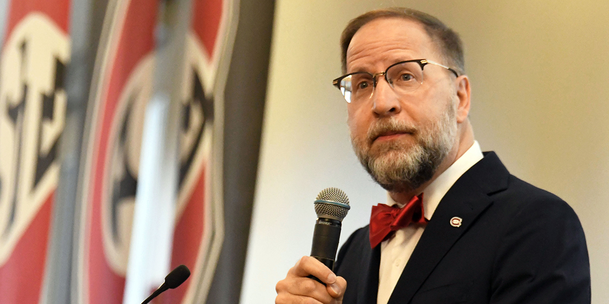 Welcome President-Designate Dr. Gregory Tomso SCSU's 26th President St. Cloud State University next to a man with glasses and a bow tie