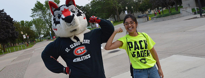 St. Cloud State student Pack Leader shows her muscles with Blizzard
