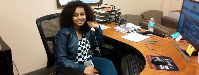 a student worker at a desk